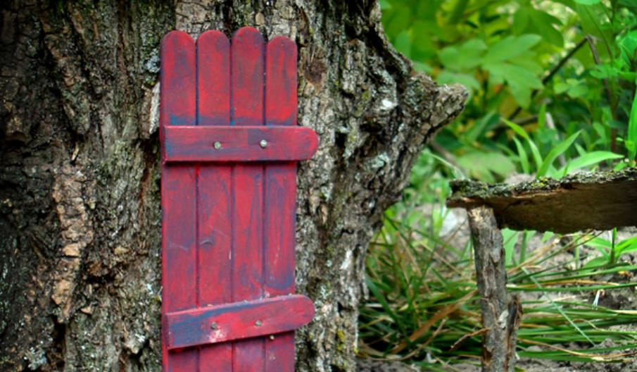 Red Fairy Door made of popsicle sticks